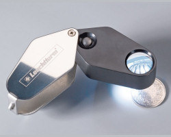 Pocket metalic magnifier. x 10